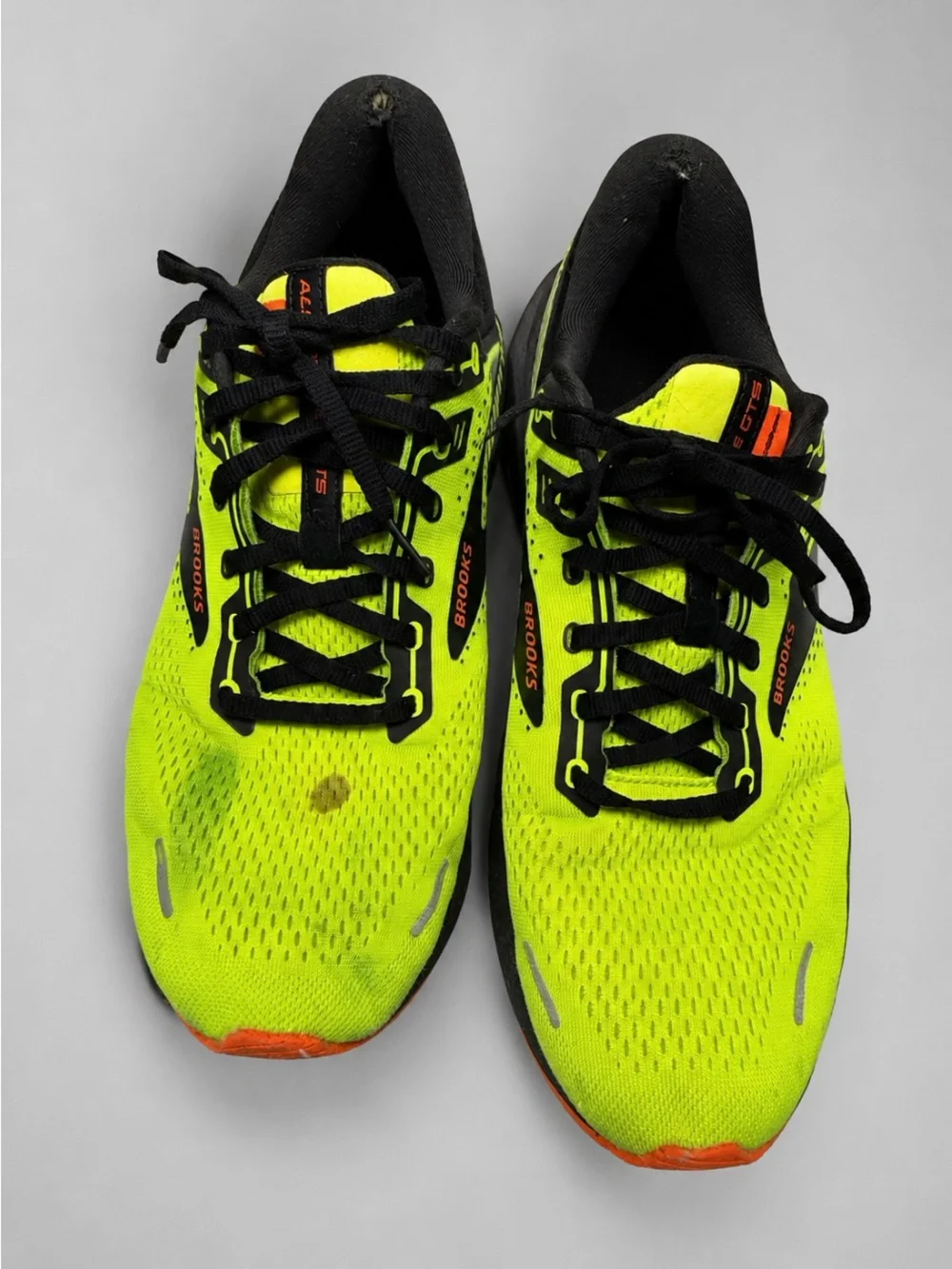 Brooks Adrenaline GTS 22 men's running shoes in a bright neon yellow, black